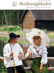 Maihaugbladet 2 2019 med forsidefoto av en lady med historiske klær og paraply sammen med en fisker i historiske klær.